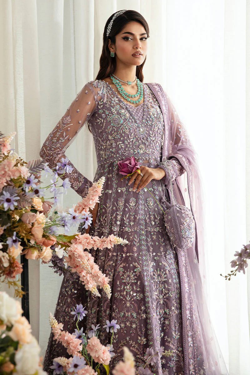 Model wearing Gulaal Zeva - GL - LP - 24V2 - 34 dress in lavender from Emalyn Luxury Formals, perfect for weddings and Pakistani clothes online in the UK.