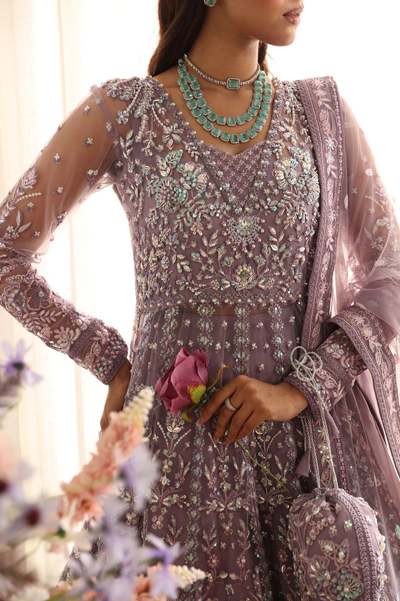 Model wearing Gulaal Zeva - GL - LP - 24V2 - 34 dress in lavender from Emalyn Luxury Formals, perfect for weddings and Pakistani clothes online in the UK.