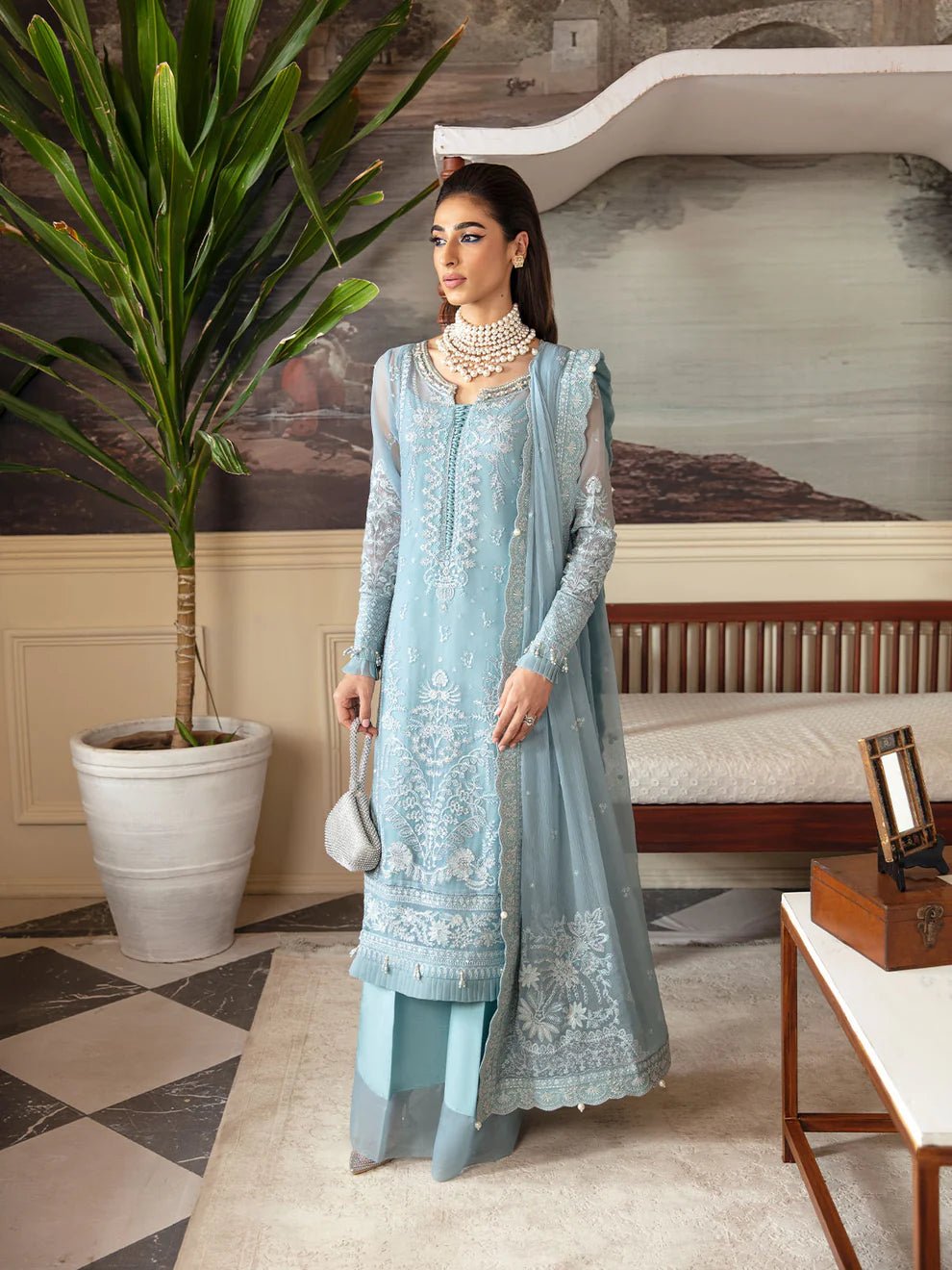 Model in Gulaal UK CALYPSO, light blue embroidered chiffon, part of the '23 V1 Pakistani collection.