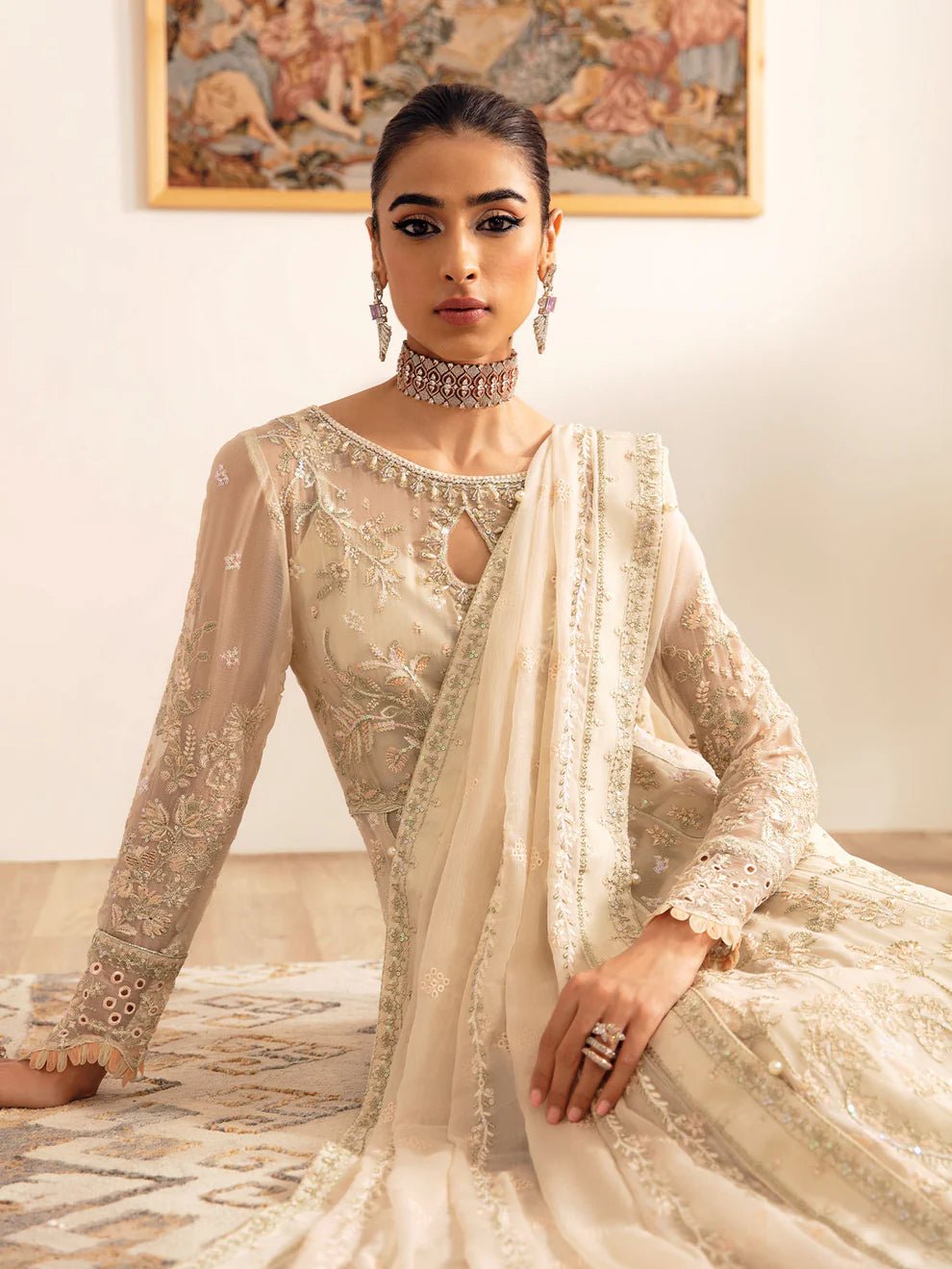 Model wearing an ivory Royale GL - EC - 23V1 - 01 dress from Gulaal's Embroidered Chiffon '23 V1 collection, showcasing Pakistani clothes online in the UK.