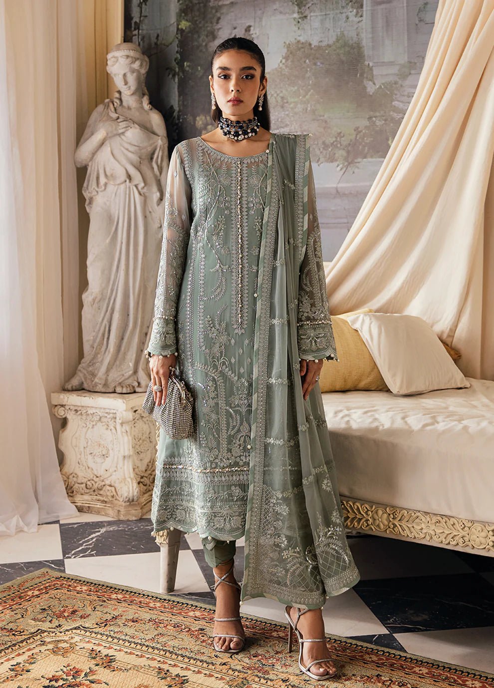 Model in Gulaal UK AMAYAH, sage green embroidered chiffon, '23 V2 Pakistani clothes UK collection.