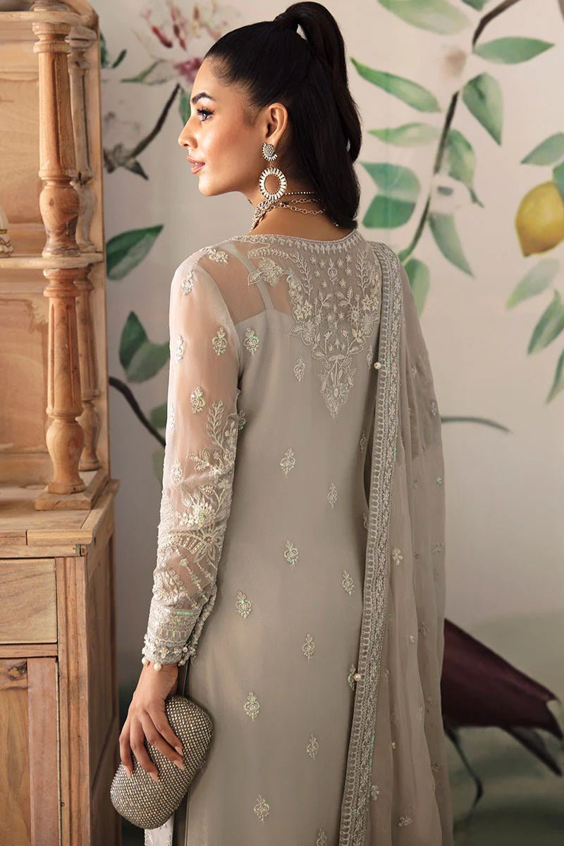 Model wearing Gulaal Embroidered Chiffon 24 Aubrey dress in silver grey, Pakistani wedding clothes online in UK.