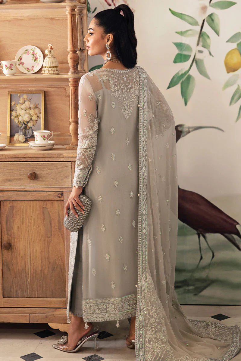 Model wearing Gulaal Embroidered Chiffon 24 Aubrey dress in silver grey, Pakistani wedding clothes online in UK.