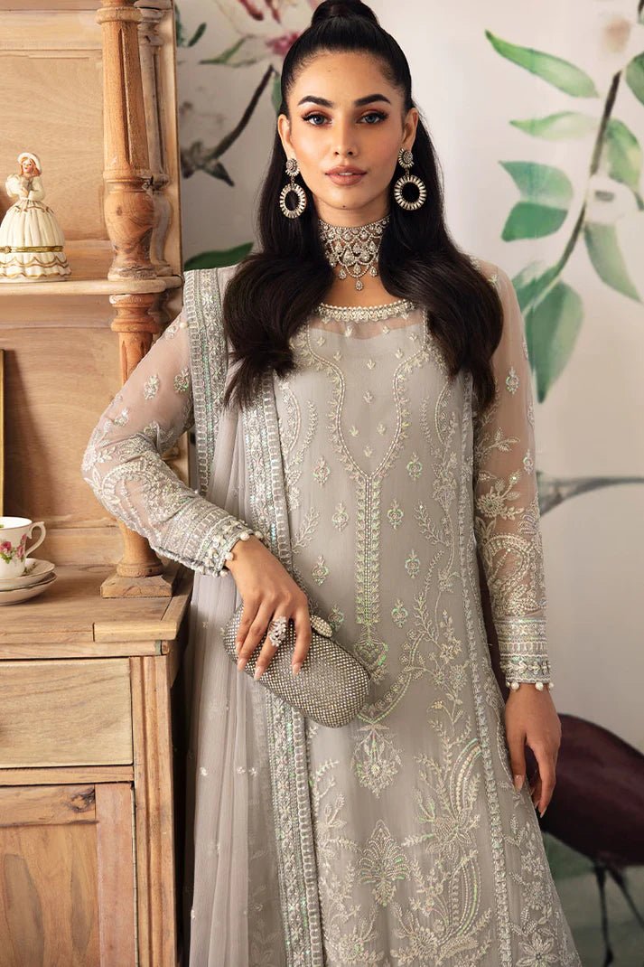 Model wearing Gulaal Embroidered Chiffon 24 Aubrey dress in silver grey, Pakistani wedding clothes online in UK.