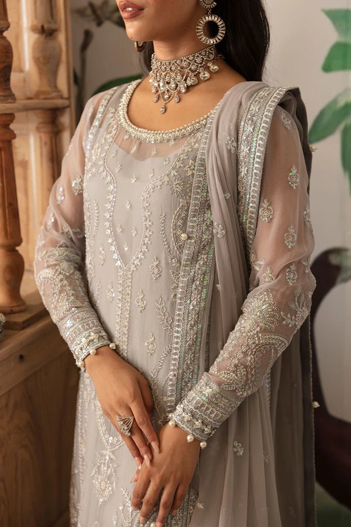 Model wearing Gulaal Embroidered Chiffon 24 Aubrey dress in silver grey, Pakistani wedding clothes online in UK.