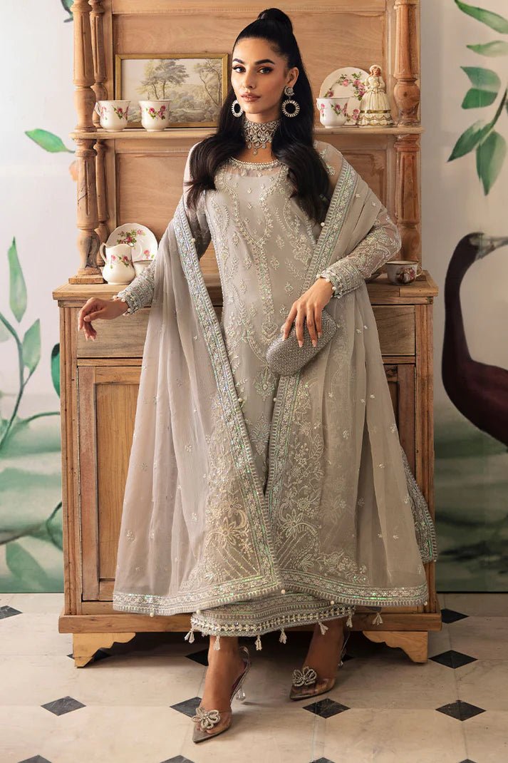 Model wearing Gulaal Embroidered Chiffon 24 Aubrey dress in silver grey, Pakistani wedding clothes online in UK.