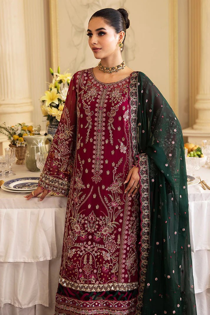 Model wearing Gulaal Embroidered Chiffon 24 Blanca dress in maroon and green, Pakistani wedding clothes online in UK.