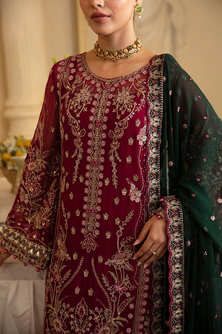 Model wearing Gulaal Embroidered Chiffon 24 Blanca dress in maroon and green, Pakistani wedding clothes online in UK.