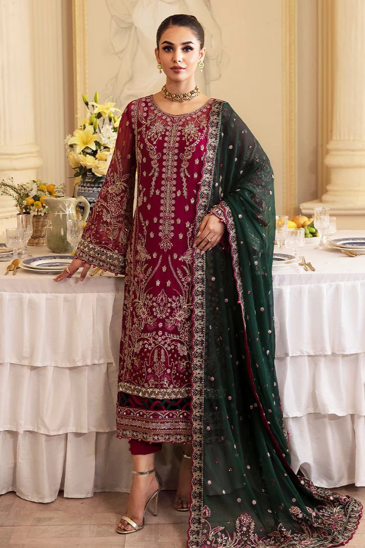 Model wearing Gulaal Embroidered Chiffon 24 Blanca dress in maroon and green, Pakistani wedding clothes online in UK.