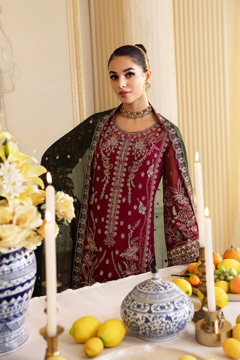 Model wearing Gulaal Embroidered Chiffon 24 Blanca dress in maroon and green, Pakistani wedding clothes online in UK.