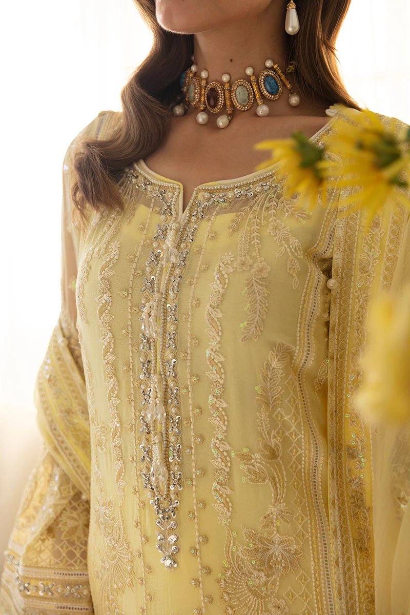 Model wearing Gulaal Embroidered Chiffon 24 Estrella dress in light yellow, showcasing Pakistani wedding clothes online in the UK.