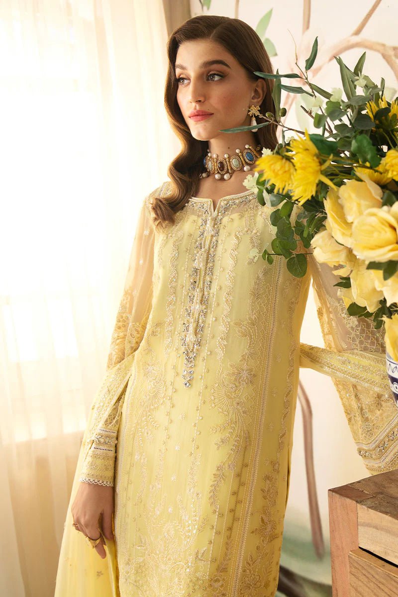 Model wearing Gulaal Embroidered Chiffon 24 Estrella dress in light yellow, showcasing Pakistani wedding clothes online in the UK.