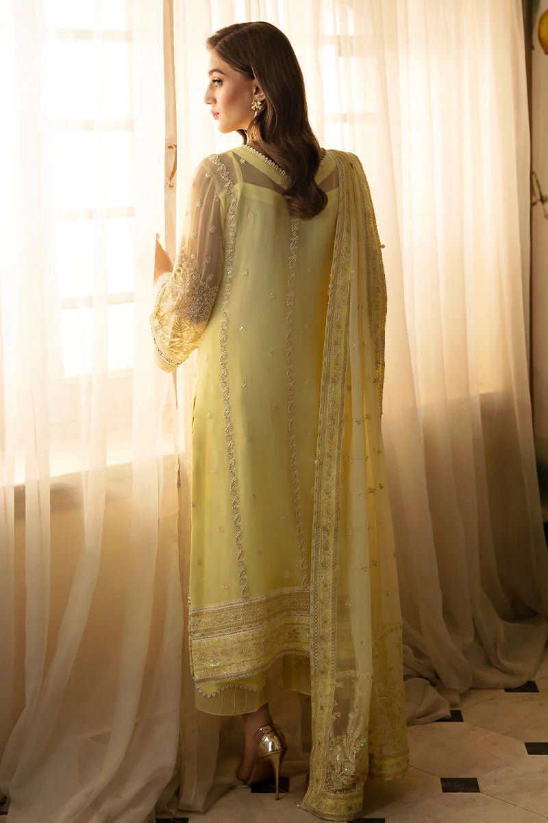 Model wearing Gulaal Embroidered Chiffon 24 Estrella dress in light yellow, showcasing Pakistani wedding clothes online in the UK.