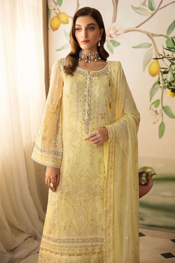 Model wearing Gulaal Embroidered Chiffon 24 Estrella dress in light yellow, showcasing Pakistani wedding clothes online in the UK.