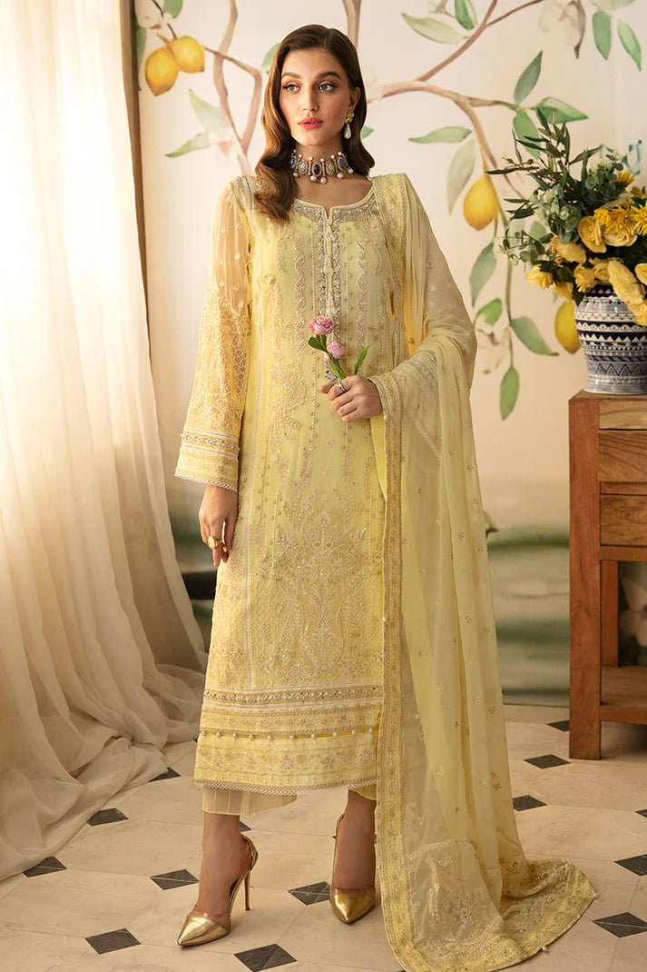 Model wearing Gulaal Embroidered Chiffon 24 Estrella dress in light yellow, showcasing Pakistani wedding clothes online in the UK.