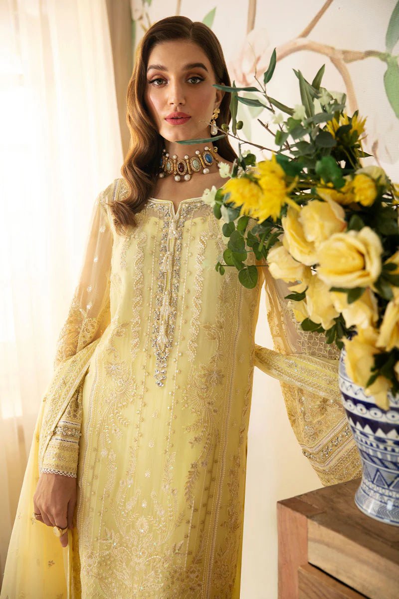 Model wearing Gulaal Embroidered Chiffon 24 Estrella dress in light yellow, showcasing Pakistani wedding clothes online in the UK.