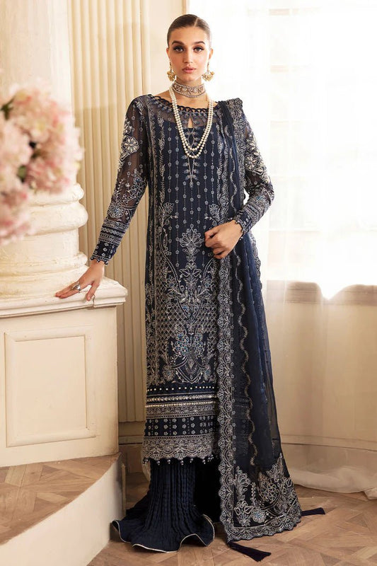 Model wearing Gulaal Embroidered Chiffon 24 Evara dress in navy blue, Pakistani wedding clothes online in UK.