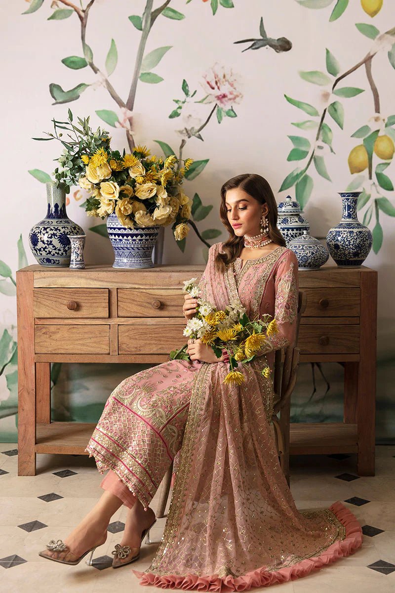 Model wearing Gulaal Embroidered Chiffon 24 Viviana dress in pink, showcasing intricate detailing, perfect for Pakistani wedding clothes online in the UK.