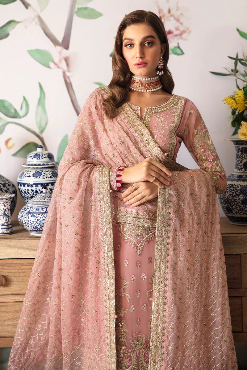 Model wearing Gulaal Embroidered Chiffon 24 Viviana dress in pink, showcasing intricate detailing, perfect for Pakistani wedding clothes online in the UK.