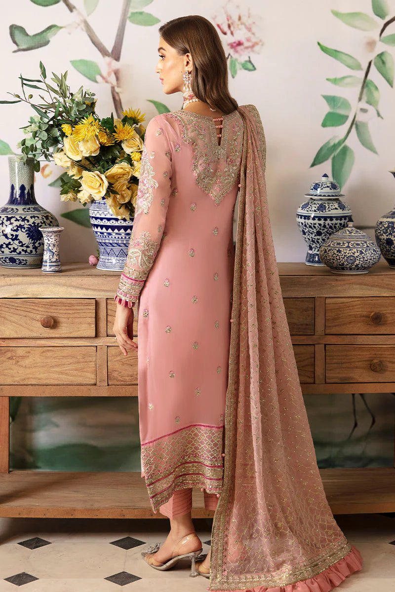 Model wearing Gulaal Embroidered Chiffon 24 Viviana dress in pink, showcasing intricate detailing, perfect for Pakistani wedding clothes online in the UK.