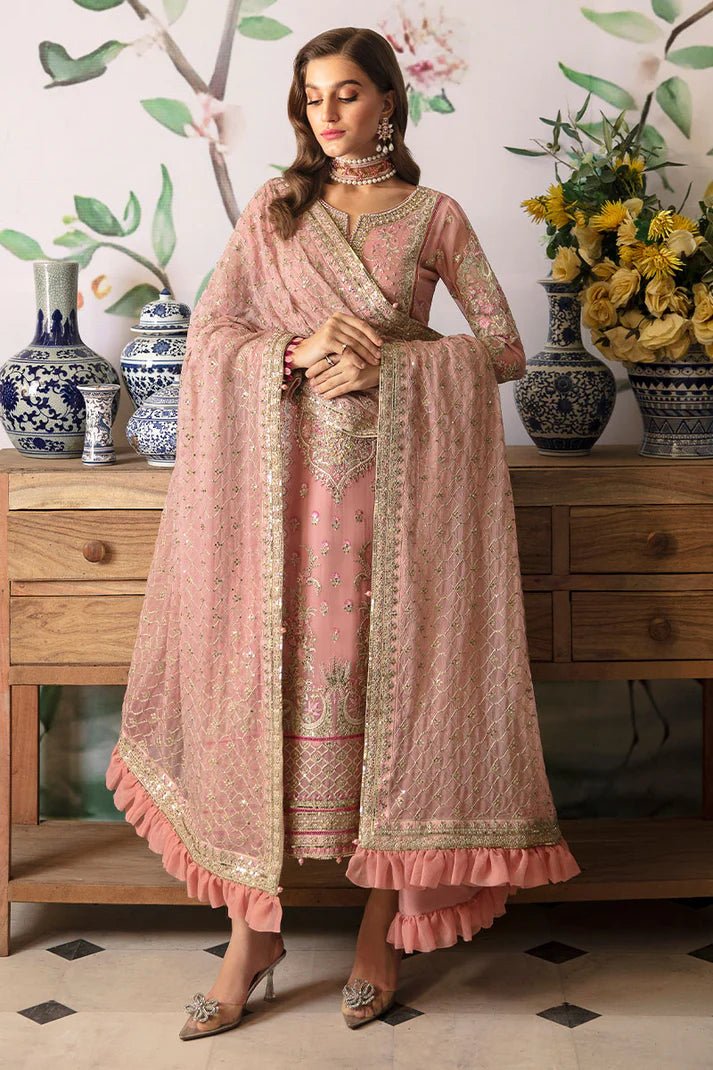 Model wearing Gulaal Embroidered Chiffon 24 Viviana dress in pink, showcasing intricate detailing, perfect for Pakistani wedding clothes online in the UK.