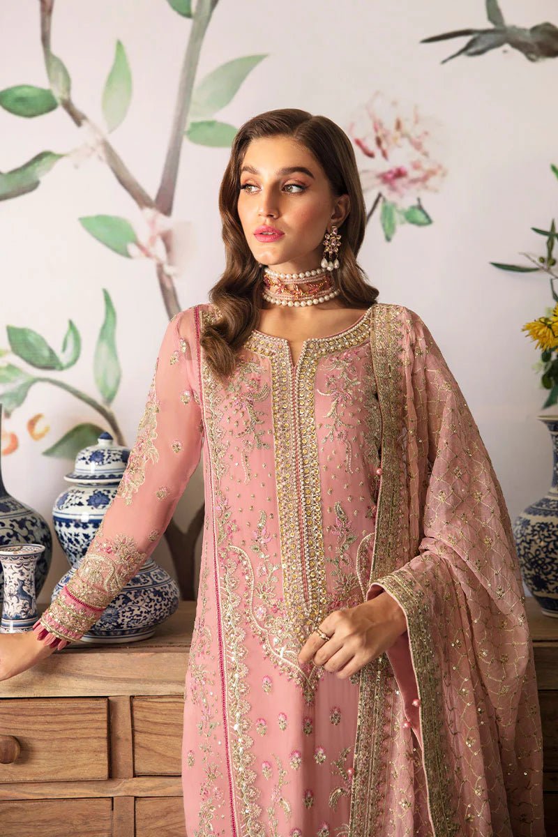 Model wearing Gulaal Embroidered Chiffon 24 Viviana dress in pink, showcasing intricate detailing, perfect for Pakistani wedding clothes online in the UK.