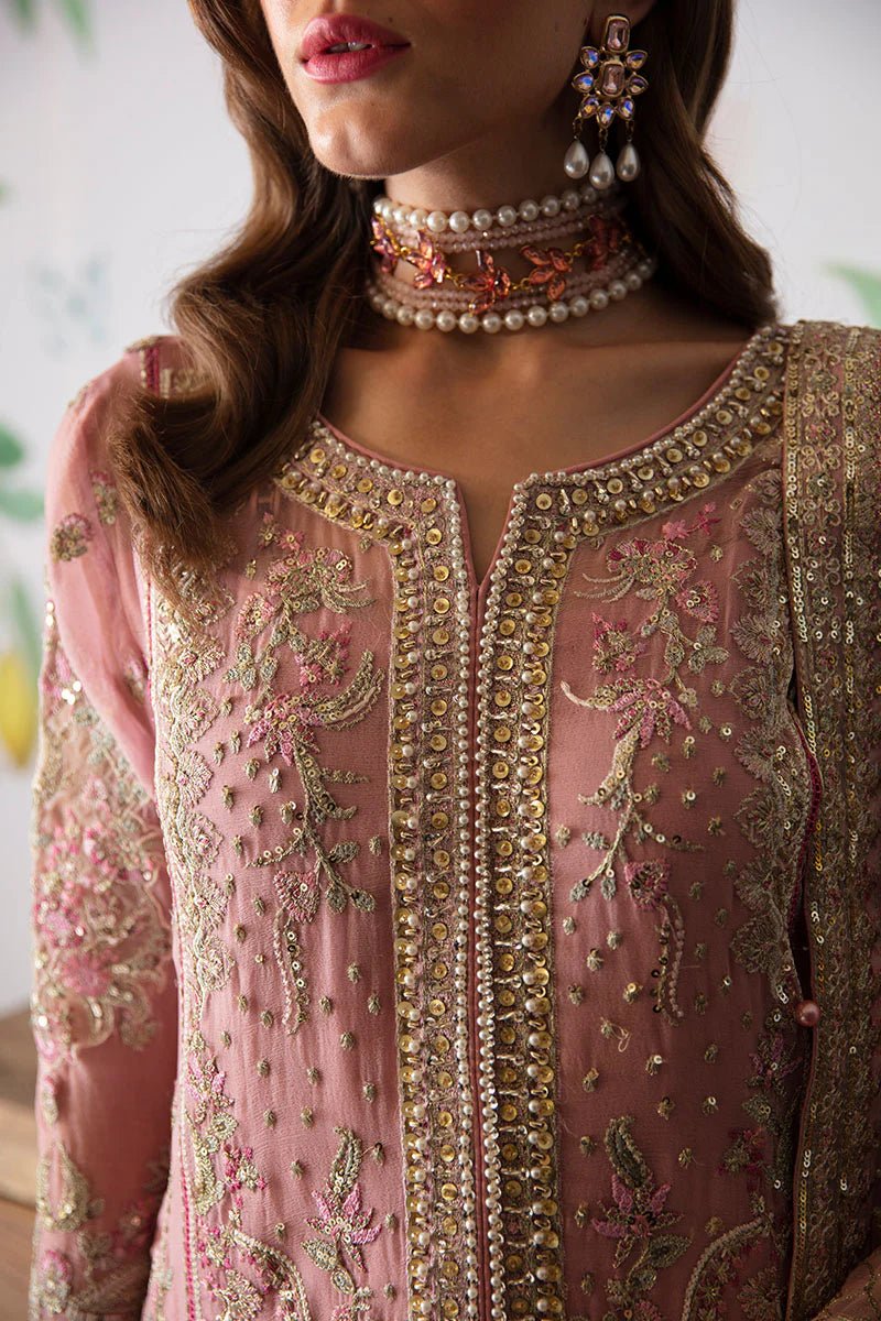 Model wearing Gulaal Embroidered Chiffon 24 Viviana dress in pink, showcasing intricate detailing, perfect for Pakistani wedding clothes online in the UK.