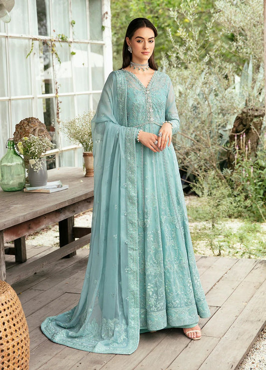 Model wearing Gulaal Iveria sea green chiffon Eid dress, Suffuse detailing, exclusive Pakistani clothes UK.