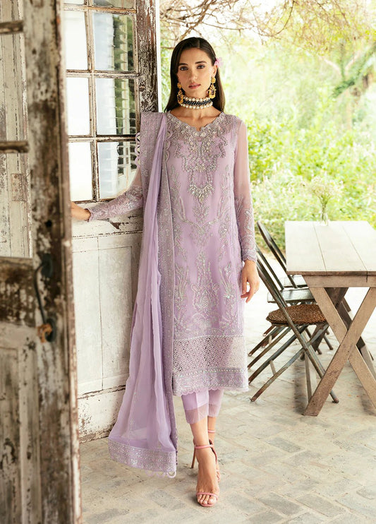 Model wearing a light purple VIOLA dress from Gulaal's Spring Ballet 2024 collection, highlighting Pakistani clothes online in the UK.