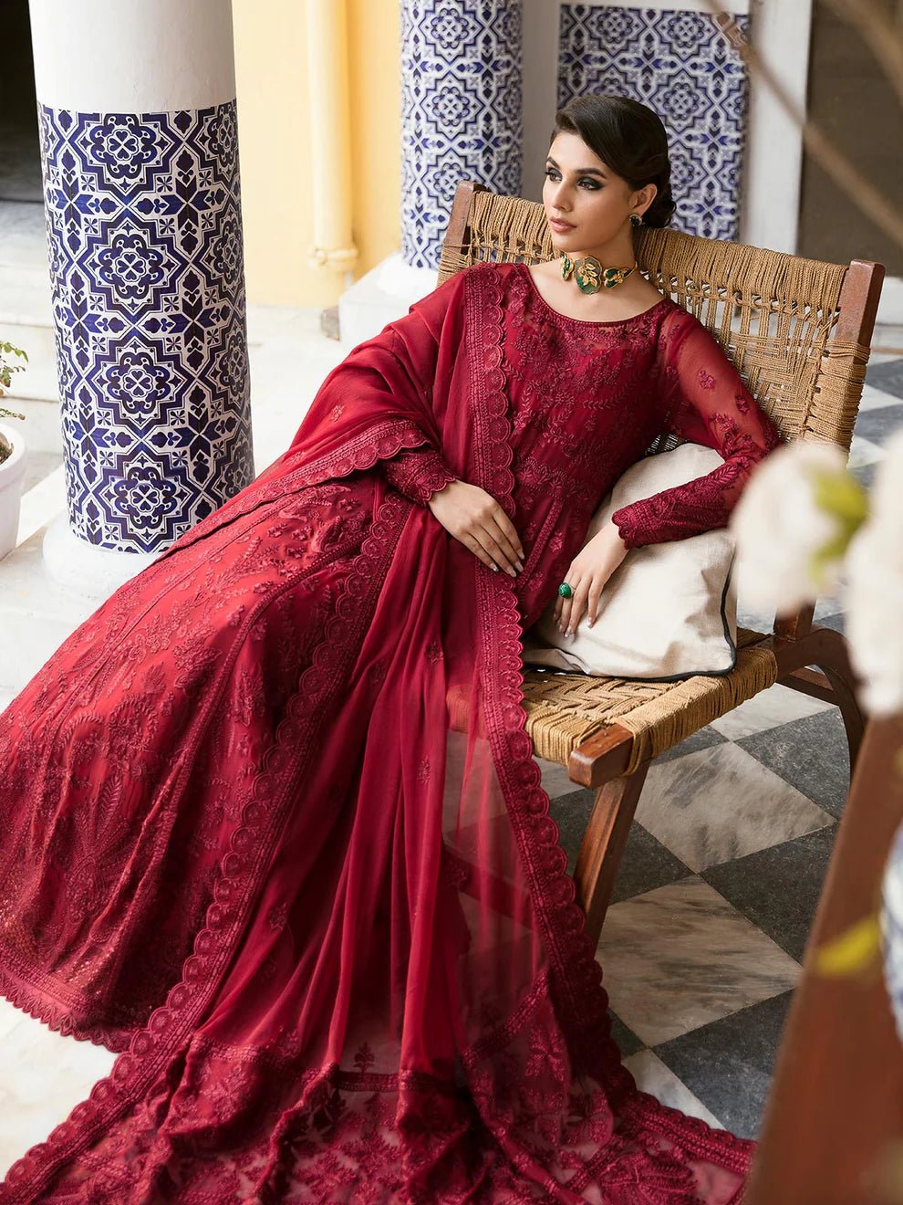 Model wearing a rich red Garnet dress from Gulaal's Embroidered Pret '23 V1 collection, showcasing Pakistani clothes online in the UK.