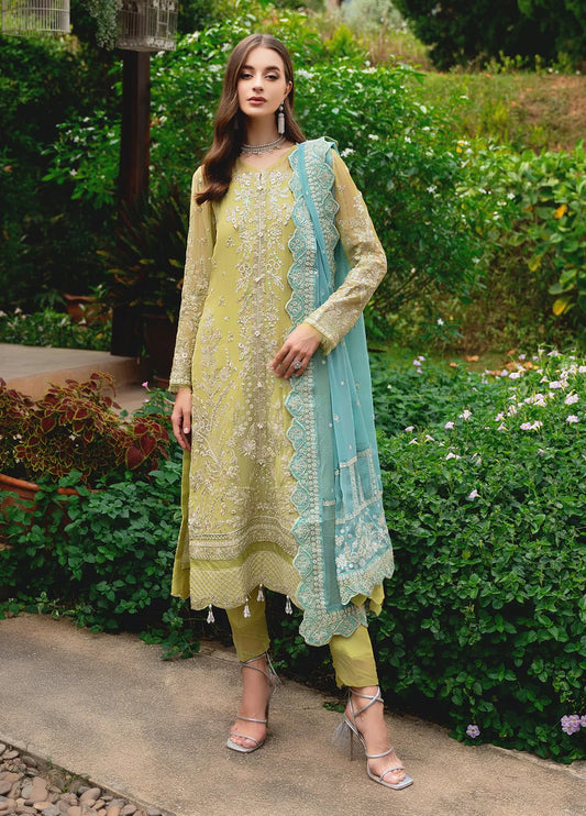 Model wearing Gulaal AMARY dress, a blend of olive and sea green, perfect for Pakistani clothes UK enthusiasts.