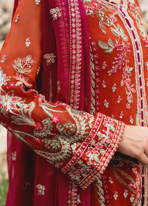 Model wearing Gulaal ATHENA dress, red embroidered Pakistani outfit UK.