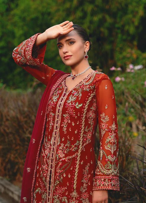 Model wearing Gulaal ATHENA dress, red embroidered Pakistani outfit UK.