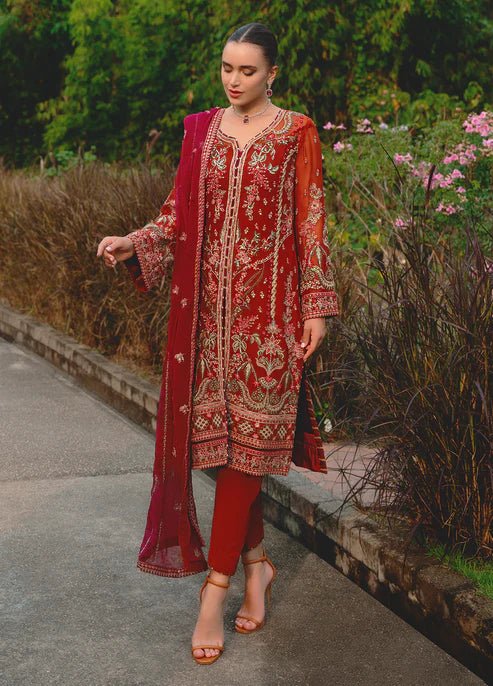 Model wearing Gulaal ATHENA dress, red embroidered Pakistani outfit UK.