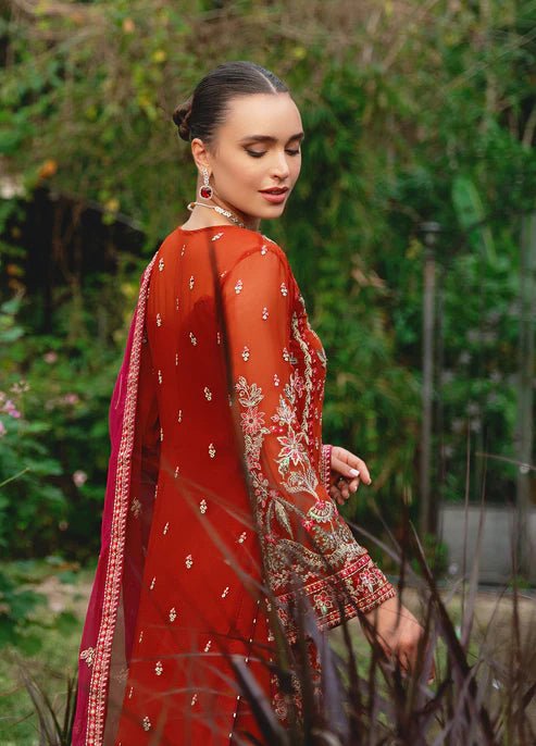 Model wearing Gulaal ATHENA dress, red embroidered Pakistani outfit UK.