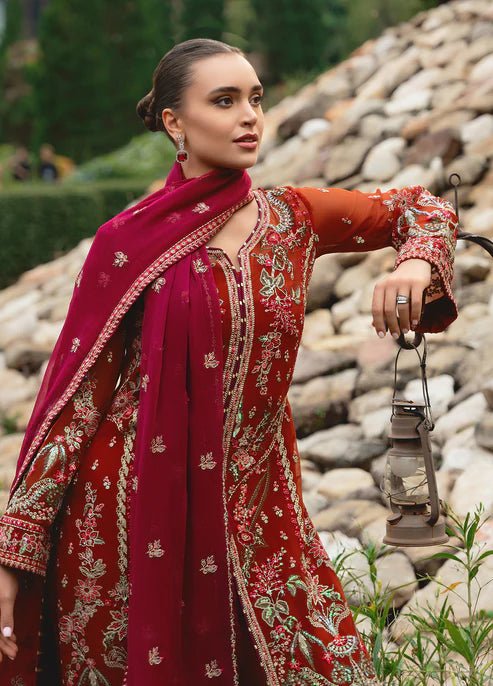 Model wearing Gulaal ATHENA dress, red embroidered Pakistani outfit UK.