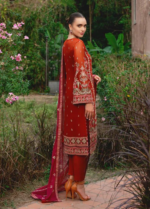 Model wearing Gulaal ATHENA dress, red embroidered Pakistani outfit UK.