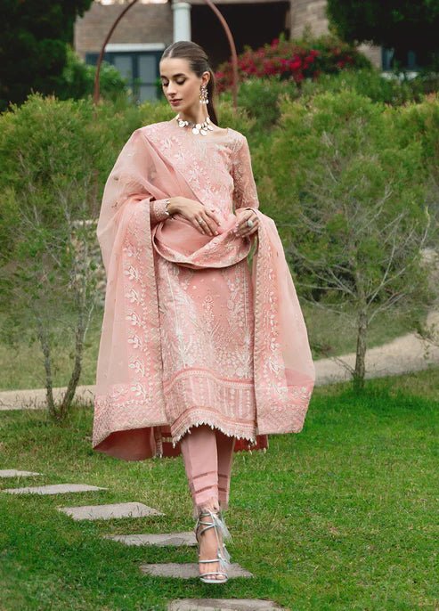 Model wearing Gulaal CRESSIDA dress, peach Pakistani clothing UK.