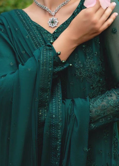 Model wearing Gulaal ELYSIA embroidered green dress, luxe Pakistani clothes UK