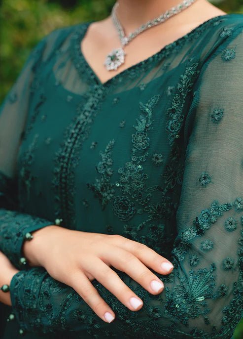 Model wearing Gulaal ELYSIA embroidered green dress, luxe Pakistani clothes UK