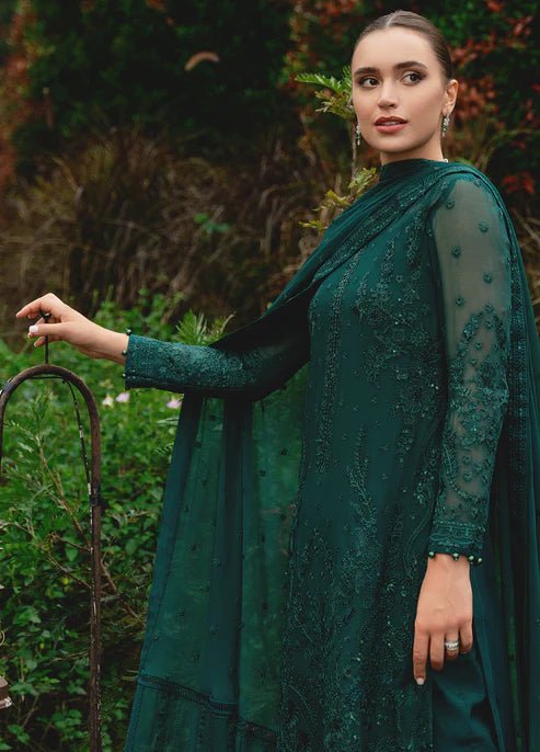 Model wearing Gulaal ELYSIA embroidered green dress, luxe Pakistani clothes UK