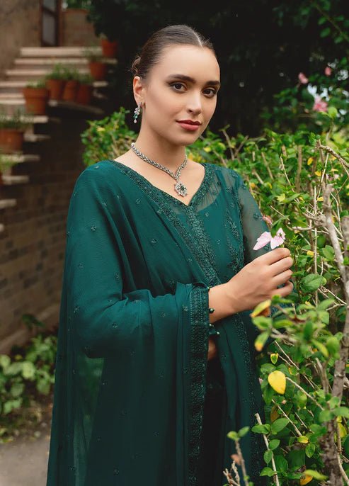 Model wearing Gulaal ELYSIA embroidered green dress, luxe Pakistani clothes UK