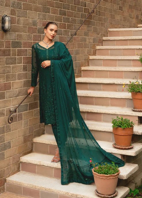 Model wearing Gulaal ELYSIA embroidered green dress, luxe Pakistani clothes UK