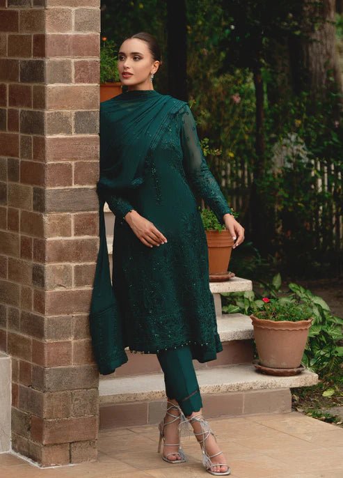 Model wearing Gulaal ELYSIA embroidered green dress, luxe Pakistani clothes UK