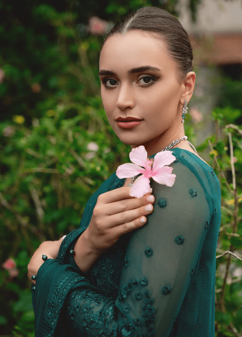 Model wearing Gulaal ELYSIA embroidered green dress, luxe Pakistani clothes UK