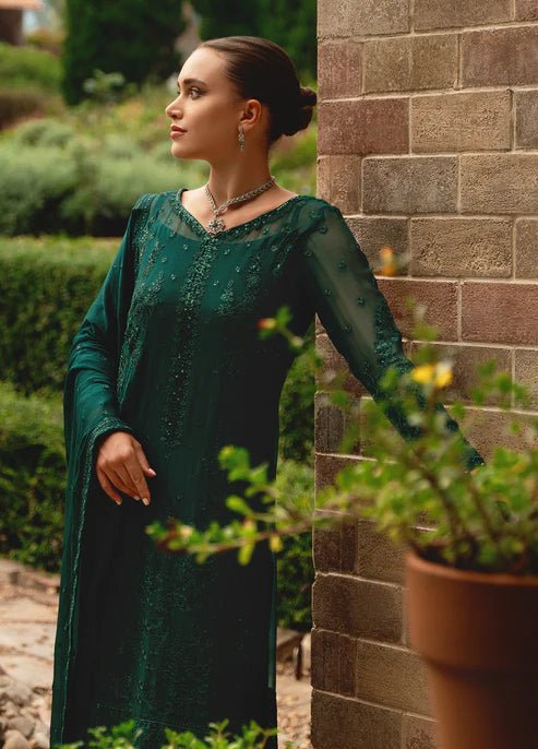 Model wearing Gulaal ELYSIA embroidered green dress, luxe Pakistani clothes UK