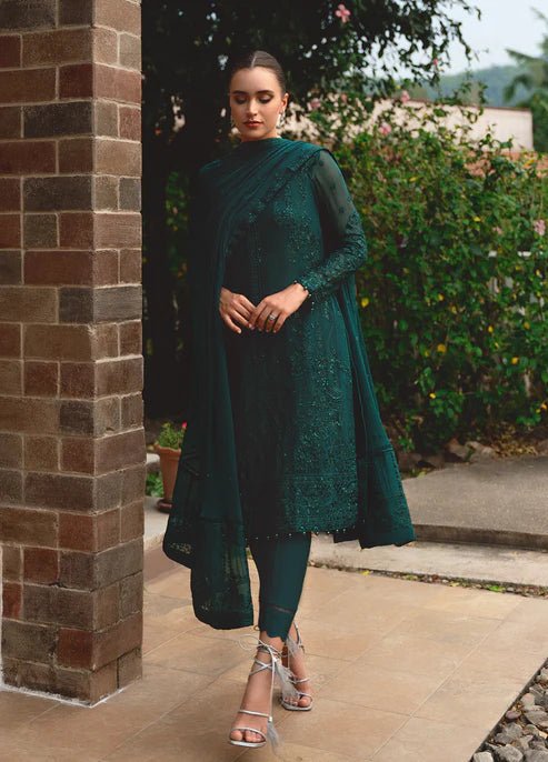 Model wearing Gulaal ELYSIA embroidered green dress, luxe Pakistani clothes UK