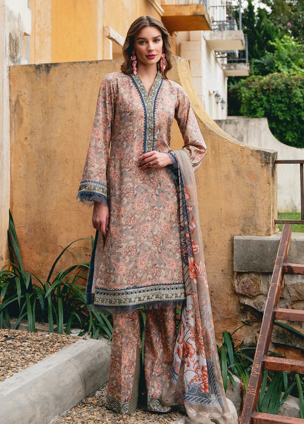 Model in Gulaal AVILA, elegant UK Pakistani outfit, floral design.