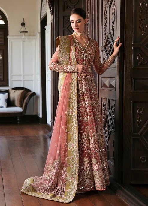 Model wearing the MARYSE pink and gold dress from Gulaal, showcasing luxurious Pakistani clothes online in the UK.