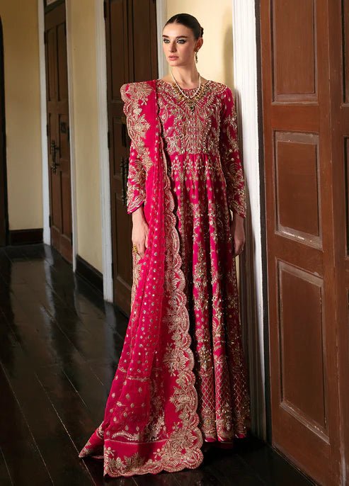 Model wearing Gulaal ROCHELLE pink embroidered dress, luxury Pakistani clothes UK.